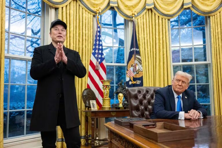 109999533-elon-musk-speaks-as-us-president-donald-trump-looks-on-in-the-oval-office-of-the-white-hou